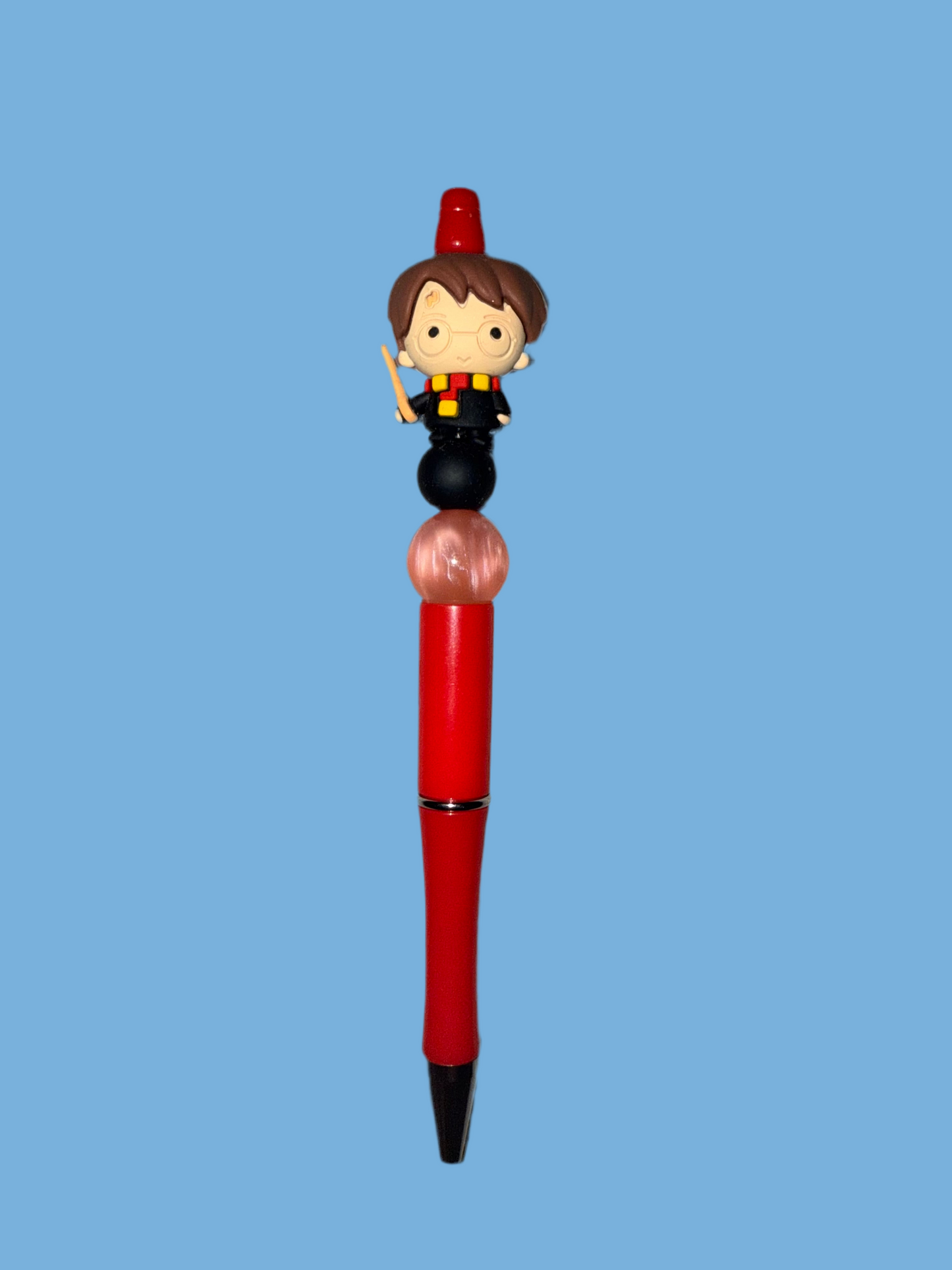 Harry Potter holding a Wand